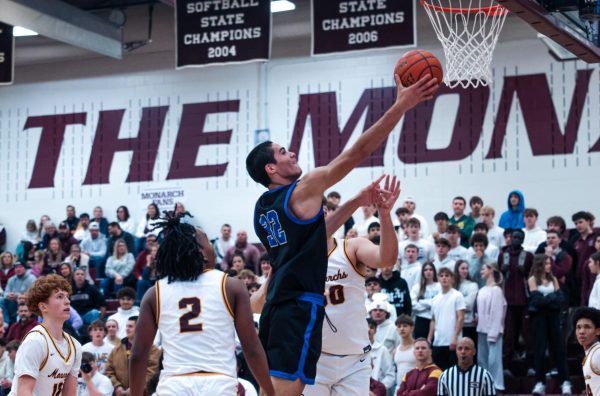 Forward Trinell Parker stretches to score a layup against Papillion La-Vista. 