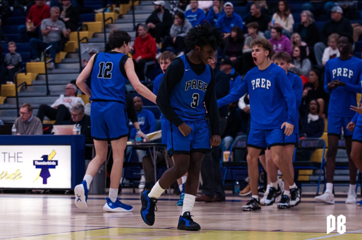 Guard Torran Carter-Brown celebrates after draining a 3-pointer against Westside.