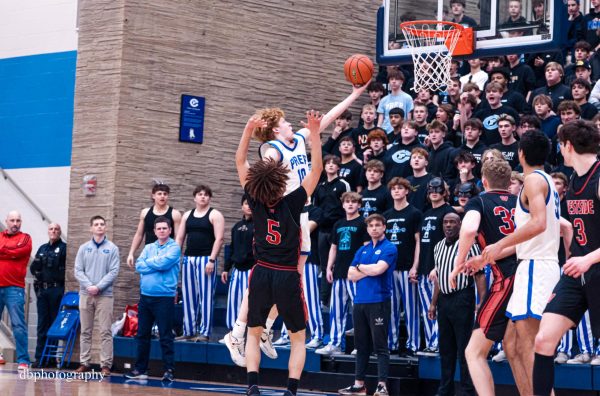 Kyle Tubrick caps his seven point first quarter with a scoop layup. 